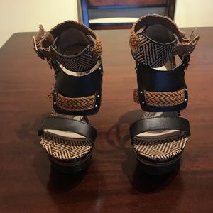 Woman’s size 5.5 Black and Tan wedge heels